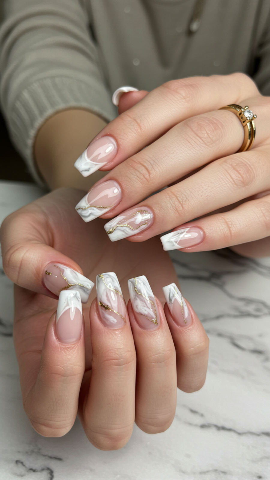 Marble Effect French Tips: Sophisticated Swirls for Luxe Appeal